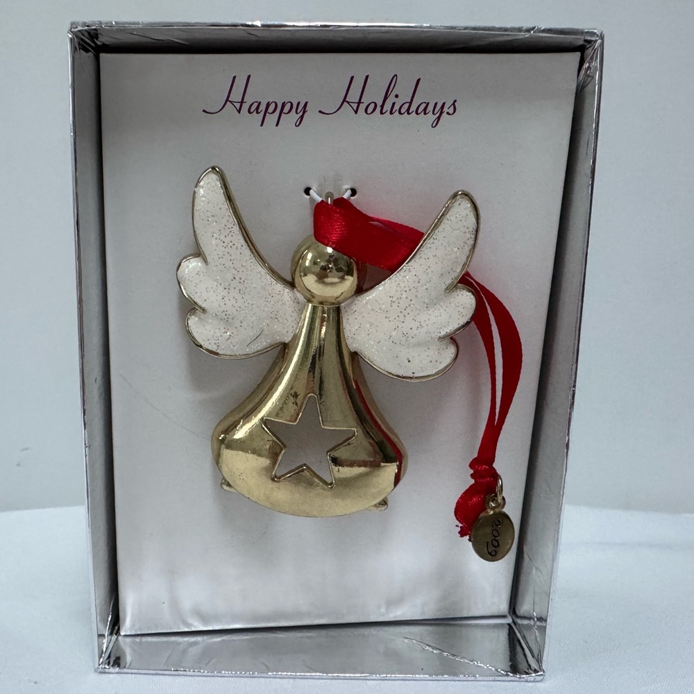 Vintage Christmas Tree Decor Angel with glitter on its wings 2009.